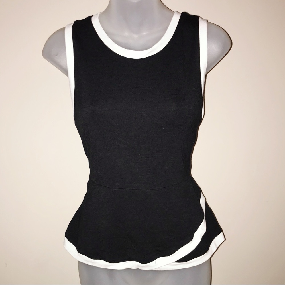 Elle black and white peplum top